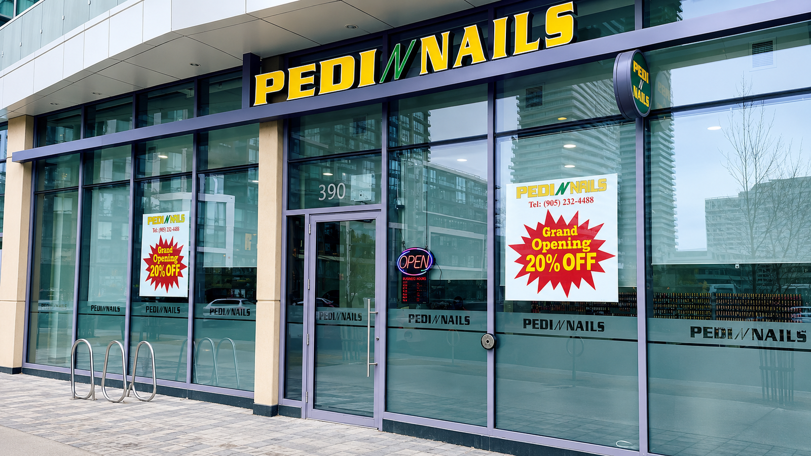 Bright main studio with pedicure chairs and Pedi N Nails neon sign